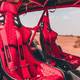 A photo of the bright red interior of the Brabus Crawler dune buggy.